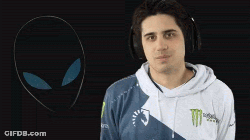 A Man Wearing Headphones And A Monster Energy Sweatshirt GIF