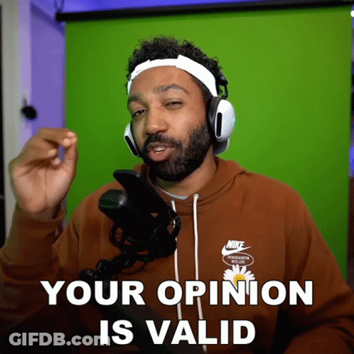 A Man Wearing Headphones And A Nike Shirt Says " Your Opinion Is Valid " GIF