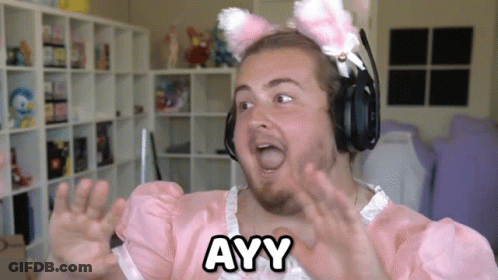 A Man Wearing Headphones And A Pink Dress With Ayy Written On It GIF