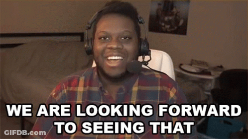 A Man Wearing Headphones And A Plaid Shirt Says We Are Looking Forward To Seeing That . GIF