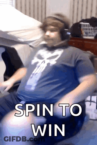 A Man Wearing Headphones And A Punisher Shirt Is Sitting On A Couch And Says Spin To Win GIF