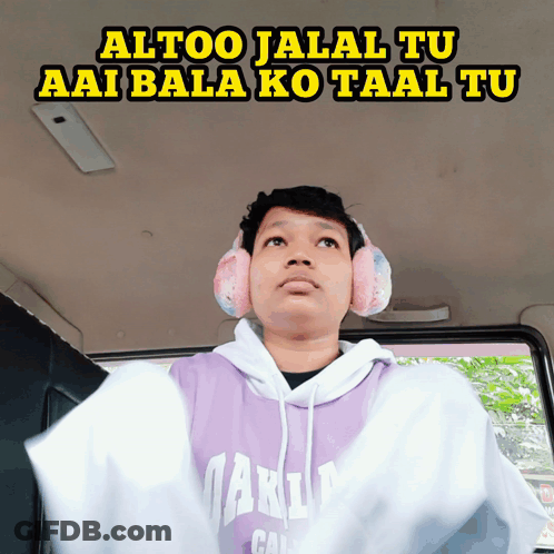 A Man Wearing Headphones And A Purple Hoodie Says Altoo Jalal Tu Aai Bala Ko Taal Tu GIF