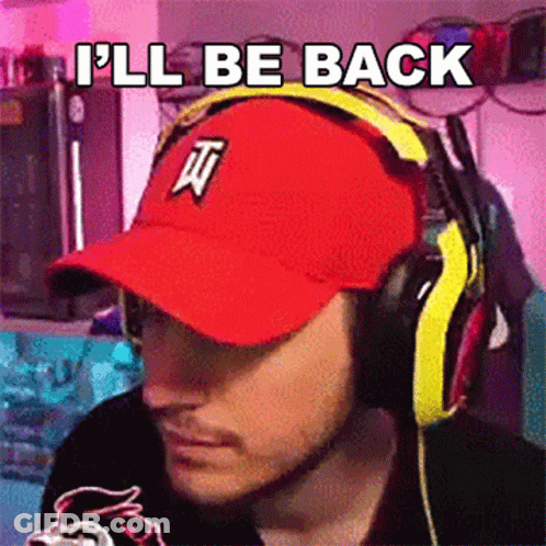 A Man Wearing Headphones And A Red Hat Has The Words I 'Ll Be Back Above His Head GIF