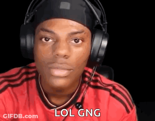 A Man Wearing Headphones And A Red Shirt Is Looking At The Camera And Saying LOL Gng . GIF