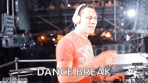 A Man Wearing Headphones And A Red Shirt Is Playing A Dj Set And The Words Dance Break Are On The Screen . GIF