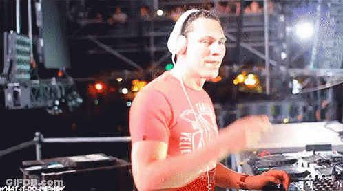 A Man Wearing Headphones And A Red Shirt That Says Yellow GIF