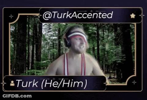 A Man Wearing Headphones And A Red White And Blue Headband With Turk Accented Written On It GIF