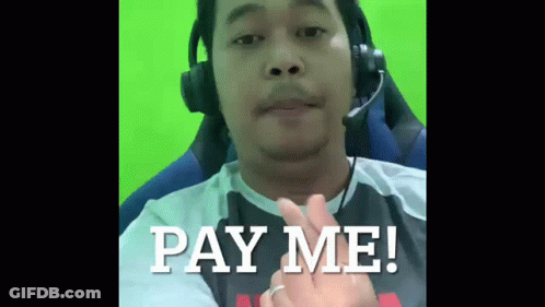 A Man Wearing Headphones And A Ring Says Pay Me GIF