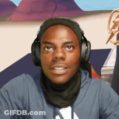 A Man Wearing Headphones And A Scarf Is Looking At The Camera GIF