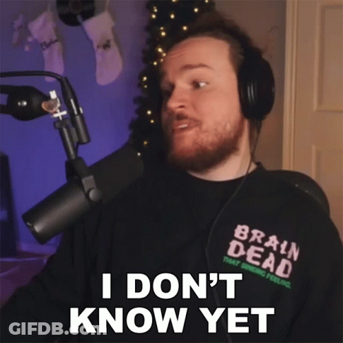 A Man Wearing Headphones And A Shirt That Says Brain Dead Says I Don 'T Know Yet GIF