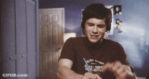A Man Wearing Headphones And A Shirt That Says Chris Superstar On It GIF