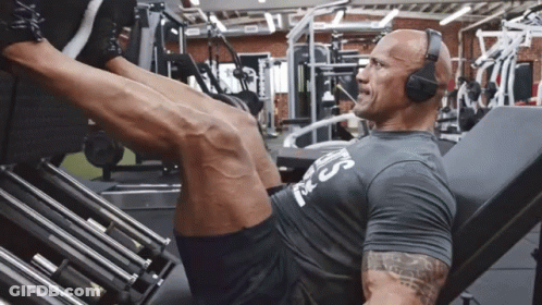 A Man Wearing Headphones And A Shirt That Says ' Coca Cola ' On It GIF