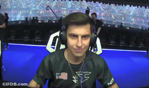 A Man Wearing Headphones And A Shirt That Says Ec On It GIF