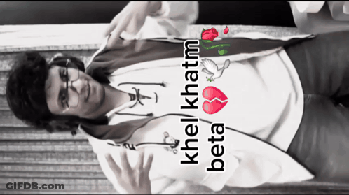 A Man Wearing Headphones And A Shirt That Says Khel Khatm Beta On It GIF