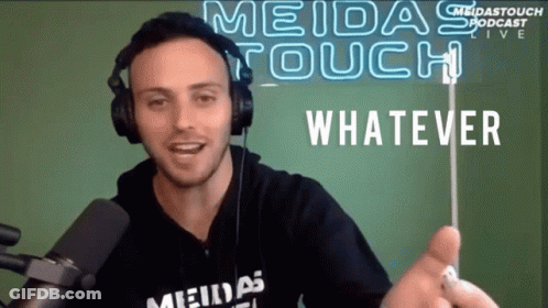 A Man Wearing Headphones And A Shirt That Says Meidas Touch GIF