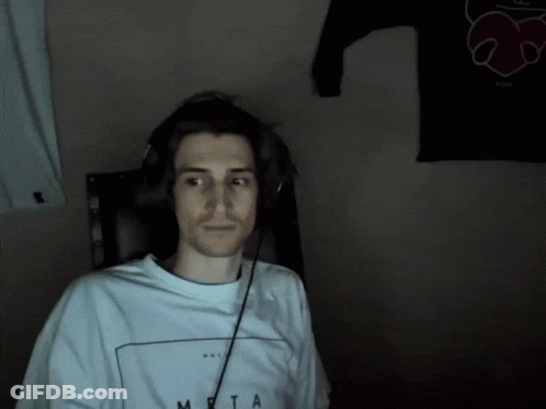 A Man Wearing Headphones And A Shirt That Says Meta On It GIF