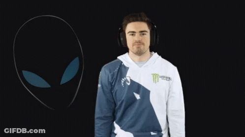A Man Wearing Headphones And A Shirt That Says Monster On It GIF