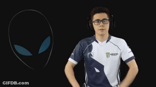 A Man Wearing Headphones And A Shirt That Says Monster GIF