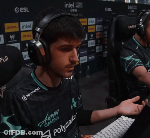 A Man Wearing Headphones And A Shirt That Says Polymarket On It GIF