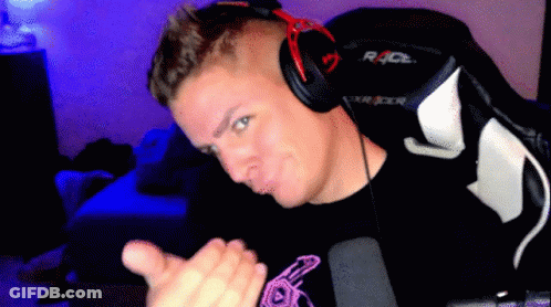 A Man Wearing Headphones And A Shirt That Says Race On It GIF