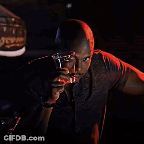 A Man Wearing Headphones And A Shirt That Says Rack On It GIF