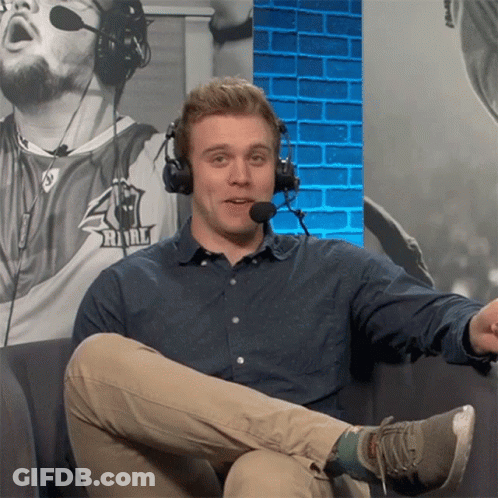Man Wearing Headphones Sitting On Couch GIF