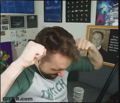 A Man Wearing Headphones And A Shirt That Says Tech On It GIF