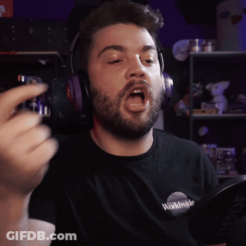 A Man Wearing Headphones And A Shirt That Says Worldwide On It GIF