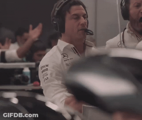 A Man Wearing Headphones And A Shirt With Epson Written On It GIF
