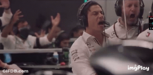 A Man Wearing Headphones And A Shirt With Mercedes Written On It GIF