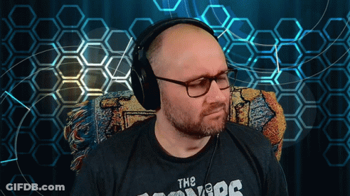 A Man Wearing Headphones And A T-Shirt That Says " The Covers " GIF