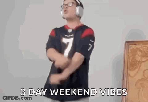A Man Wearing Headphones And A Texans Jersey Is Dancing In A Room . GIF