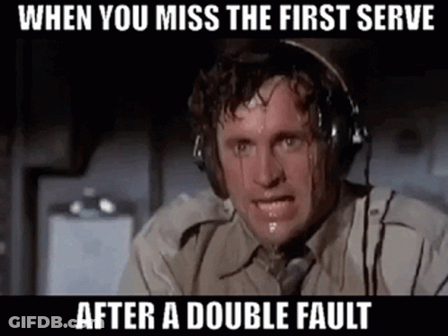 A Man Wearing Headphones And A Tie Is Sweating While Looking At The Camera . GIF
