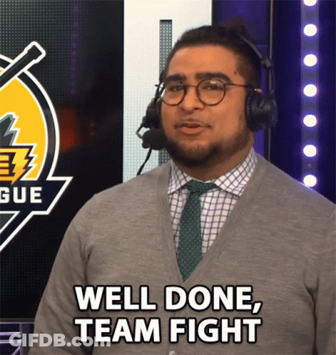A Man Wearing Headphones And A Tie Says Well Done Team Fight GIF