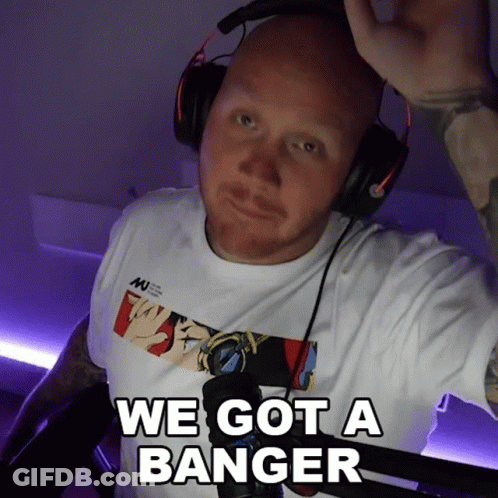 A Man Wearing Headphones And A White Shirt Says We Got A Banger GIF