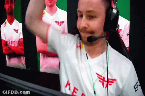 A Man Wearing Headphones And A White Shirt That Says Kef On It GIF