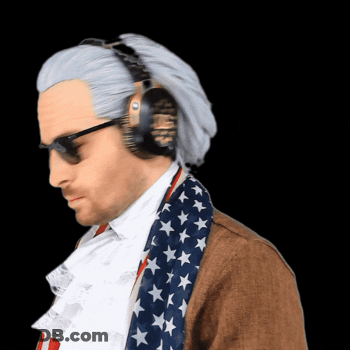A Man Wearing Headphones And An American Flag Scarf Looks Down GIF