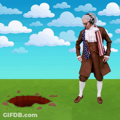 A Man Wearing Headphones And An American Flag Scarf Stands In Front Of A Hole GIF