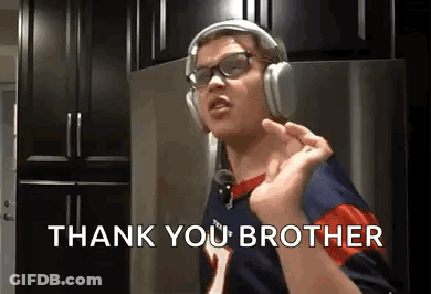 A Man Wearing Headphones And Glasses Is Singing A Song And Saying Thank You Brother . GIF