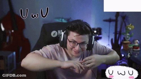 A Man Wearing Headphones And Glasses Is Sitting In A Chair With A Yamaha Logo On It GIF