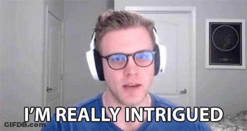 A Man Wearing Headphones And Glasses Is Talking On A Video Call . GIF