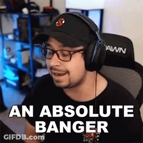 A Man Wearing Headphones And Glasses Says An Absolute Banger . GIF
