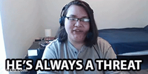 A Man Wearing Headphones And Glasses Says He 'S Always A Threat . GIF