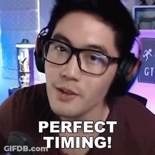 A Man Wearing Headphones And Glasses Says Perfect Timing GIF
