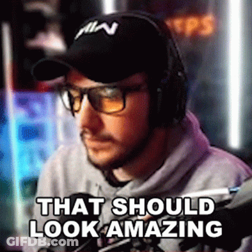 A Man Wearing Headphones And Sunglasses Is Sitting In Front Of A Microphone And Says That Should Look Amazing GIF