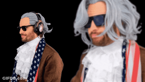A Man Wearing Headphones And Sunglasses Is Standing In Front Of A Black Screen GIF