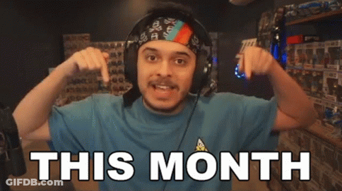 A Man Wearing Headphones Flexes His Muscles In Front Of The Words This Month GIF