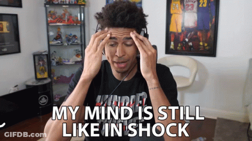 A Man Wearing Headphones Has His Hands On His Head And The Words My Mind Is Still Like In Shock GIF