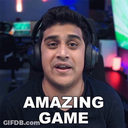 A Man Wearing Headphones Has The Words Amazing Game Written On His Face GIF