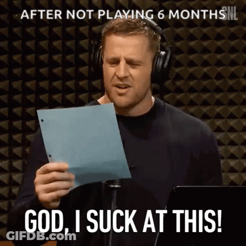 A Man Wearing Headphones Holds A Piece Of Paper In Front Of A Microphone And Says God I Suck At This GIF